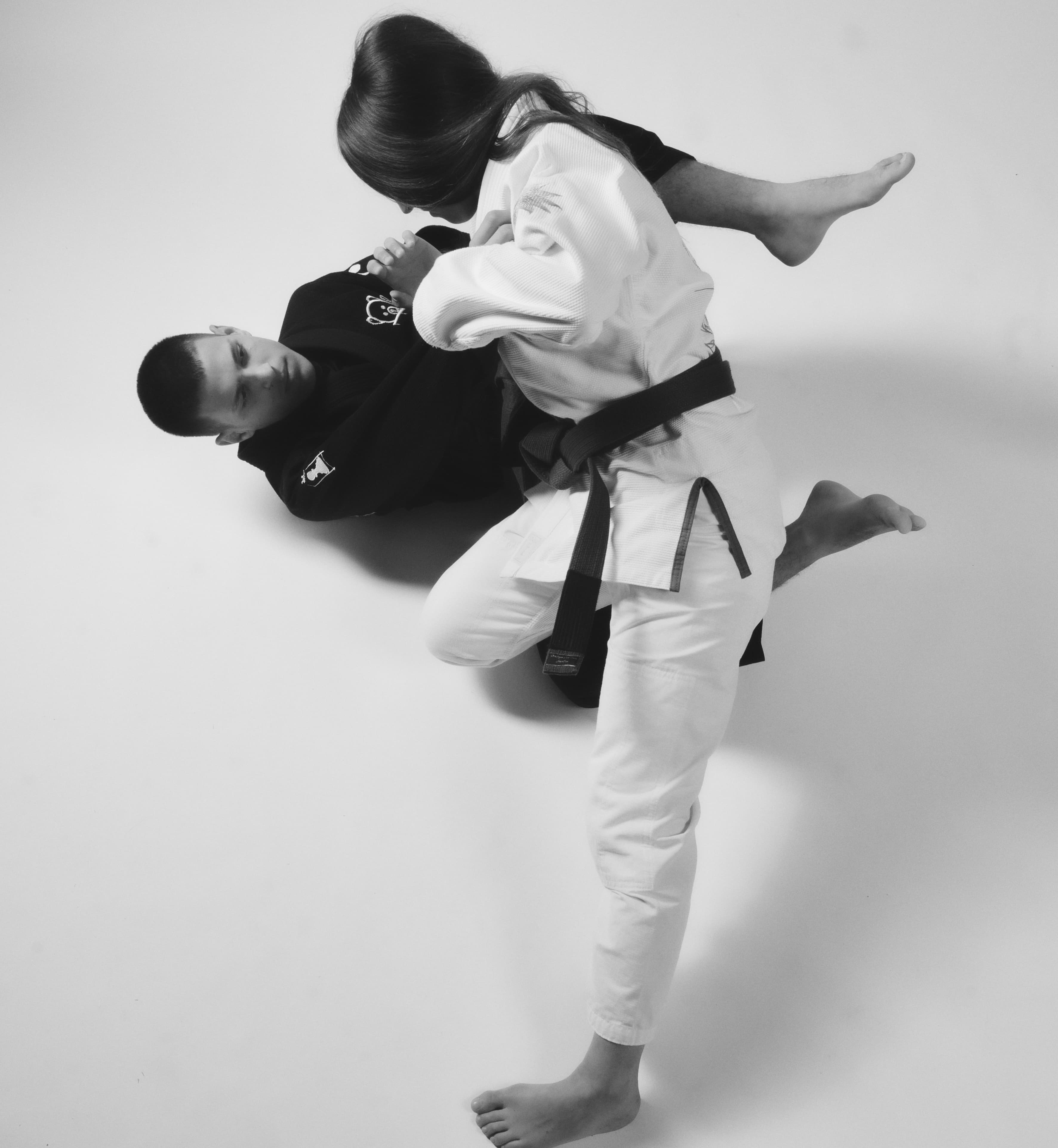 Deux pratiquants de jiu-jitsu brésilien en kimono Stratégie d'un Pion